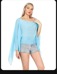 Close-up of lightweight light blue silk-like chiffon shawl with elegant drape effect