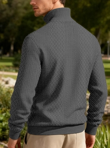 Detail of grey men's jacquard knit jacket with zip stand collar and geometric texture