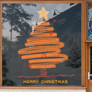 Christmas tree window sticker with Merry Christmas text on glass storefront door