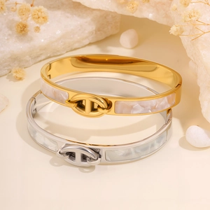 Titanium steel bangles with mother-of-pearl inlay and anchor link buckle design