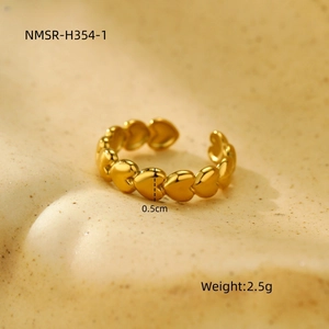 Macro shot of gold heart-shaped ring band showing 0.5cm width and 2.5g weight details