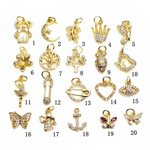 20 assorted gold micro-pave zirconia charms including butterflies, hearts and celestial motifs