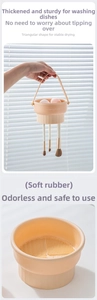 Macro detail of beige silicone makeup brush cleaning bowl with textured bottom and drying rack