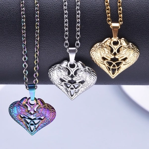 Wolf head heart pendant necklace in gold, silver, and rainbow steel finishes