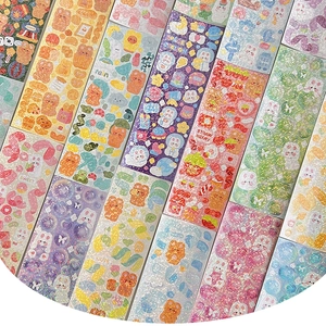 Close-up of cute cartoon PET stickers with laser holographic finish and various patterns