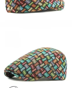 Detailed close-up of colorful jacquard plaid texture and metallic buckle on the retro beret
