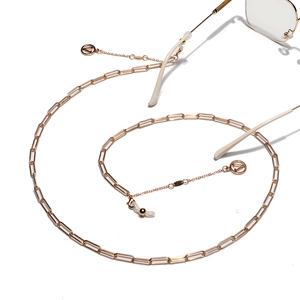 Golden V-logo paperclip eyewear chain with tassels and anti-slip silicone rings for glasses