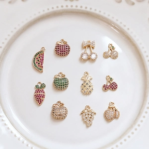 Golden fruit pendants with colorful zircon stones including watermelon, cherry and apple