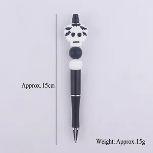 Halloween skull beaded pen featuring black barrel and white skeleton topper, 15cm length
