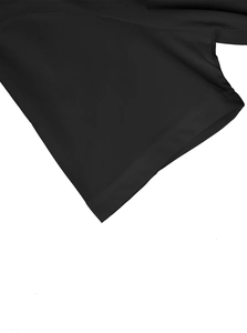 Macro shot of double-needle stitching and premium 230g heavy cotton texture on black T-shirt