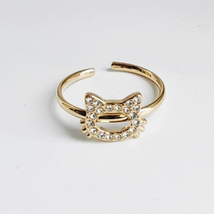 Adjustable 18K gold-plated titanium steel ring with sparkling pave crystals cat-head design