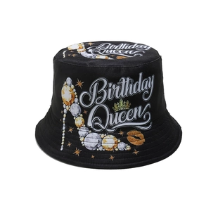Detail of black cotton bucket hat with Birthday Queen text and high heel pearl design