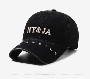Detailed side view of washed cotton baseball cap with NY&JA embroidery and PROFILE text