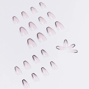 Short ballet nude press-on nails with minimalist black French tips in a 24-piece set