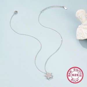 Close-up of a S925 sterling silver star pendant necklace with cubic zirconia detailing