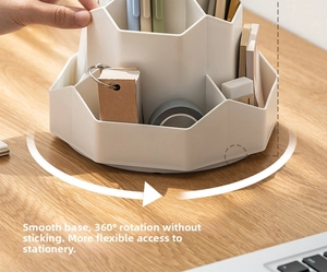 Detail view of the 360-degree rotating desktop stationery organizer with multiple compartments