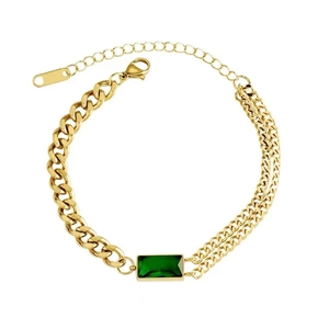 Gold chain bracelet featuring a green emerald-cut stone with asymmetrical link design