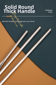 Close-up of ergonomic solid round 304 stainless steel brushed metal cutlery handles