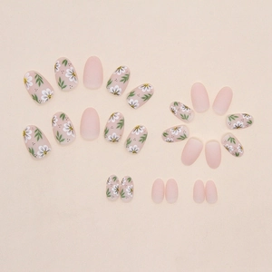 Short oval press-on nails with matte nude pink and white daisy floral patterns