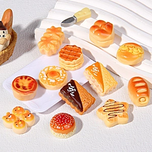 Miniature resin bread models for DIY crafts shown on a white textured background