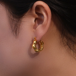 Polished 18K gold plated twisted knot earrings with chunky spiral hoop design