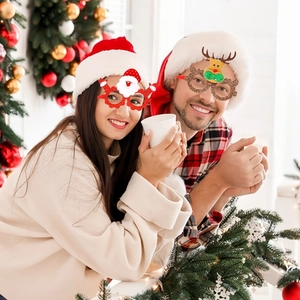 Festive Santa and Reindeer glasses frames for Christmas party decorations with glitter finish