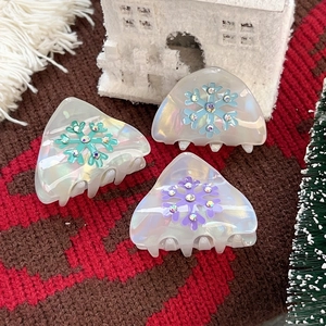 Winter snowflake hair claws in candy colors with rhinestones for a festive Christmas look