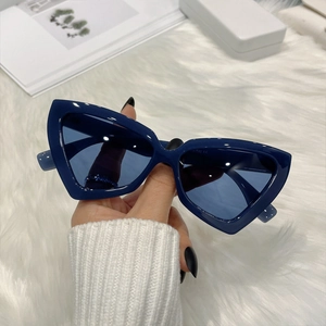Fashionable navy blue cat-eye sunglasses with geometric frames and UV protection