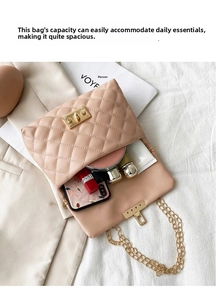 Internal view of beige quilted chain bag showing capacity for lipstick and phone