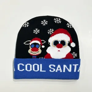 Close-up of knit beanie featuring Cool Santa pattern and snowflakes on black background