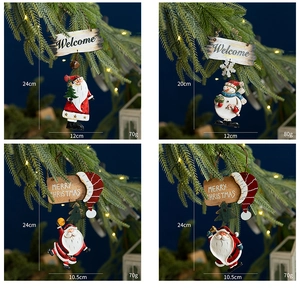 Detailed view of resin Christmas tree ornaments with festive Santa and Snowman designs