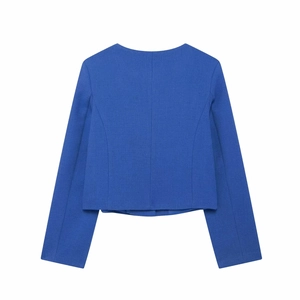 Vue arrière d'une veste courte bleu roi montrant la texture du tissu tissé haute densité