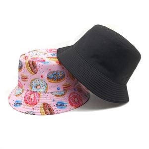 Reversible bucket hat set with black and pink donut patterns for outdoor sun protection