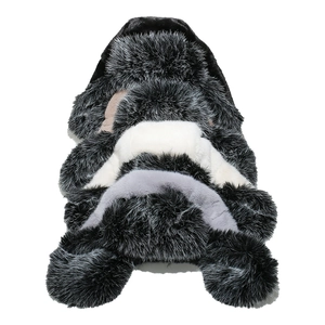 Macro detail of plush faux fur texture on a thick winter faux fox fur aviator hat