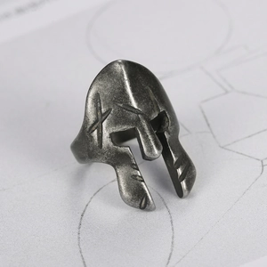 Close-up of vintage silver Spartan helmet ring showing detailed antique metal finish