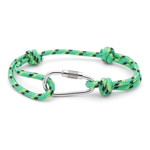 Detail of green RPET braided cord bracelet with silver metal carabiner clasp on white background