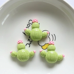Three green resin cactus figurines with pink flowers for DIY crafts and accessories