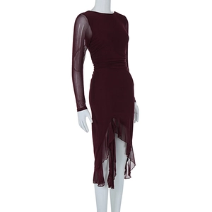 Close-up of wine red slim dress with sheer mesh sleeves and ruffled asymmetrical hemline
