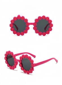 Detail view of pink daisy flower sunglasses for kids with grey lenses from two angles