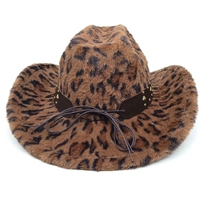Detailed view of leopard print plush cowboy hat with studded leather band and gold accents
