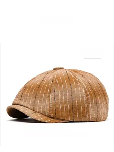 Detail showing the khaki striped texture and fabric of this vintage newsboy cap