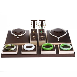 Brown and champagne gold jewelry display set for necklaces, rings, and bracelets