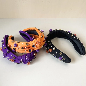 Handmade knotted Halloween headbands with colorful pearls, rhinestones and pumpkin motifs