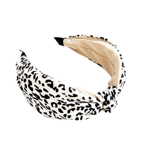 Fashionable black and white leopard print knotted headband made of soft fabric for women