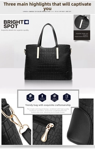 Close-up of black crocodile pattern faux leather handbag with high-quality gold hardware details