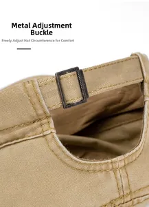 Detail of adjustable metal buckle and khaki cotton twill fabric on flat top army cap