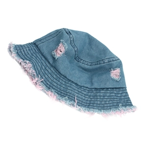 Detail of blue denim bucket hat with pink distressed holes and frayed raw edges