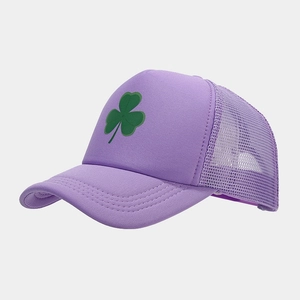 Close-up of purple baseball cap with green clover print and breathable mesh detail