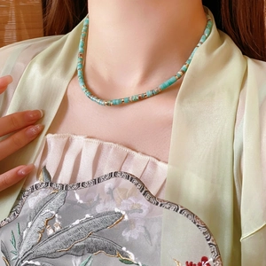 Elegant beaded Shoushan stone necklace with golden spacers for a retro chic look