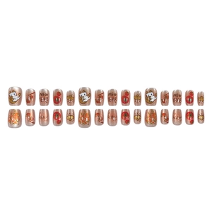 Faux ongles champagne pailletés avec motifs festifs de dragon et fleurs pour l'An